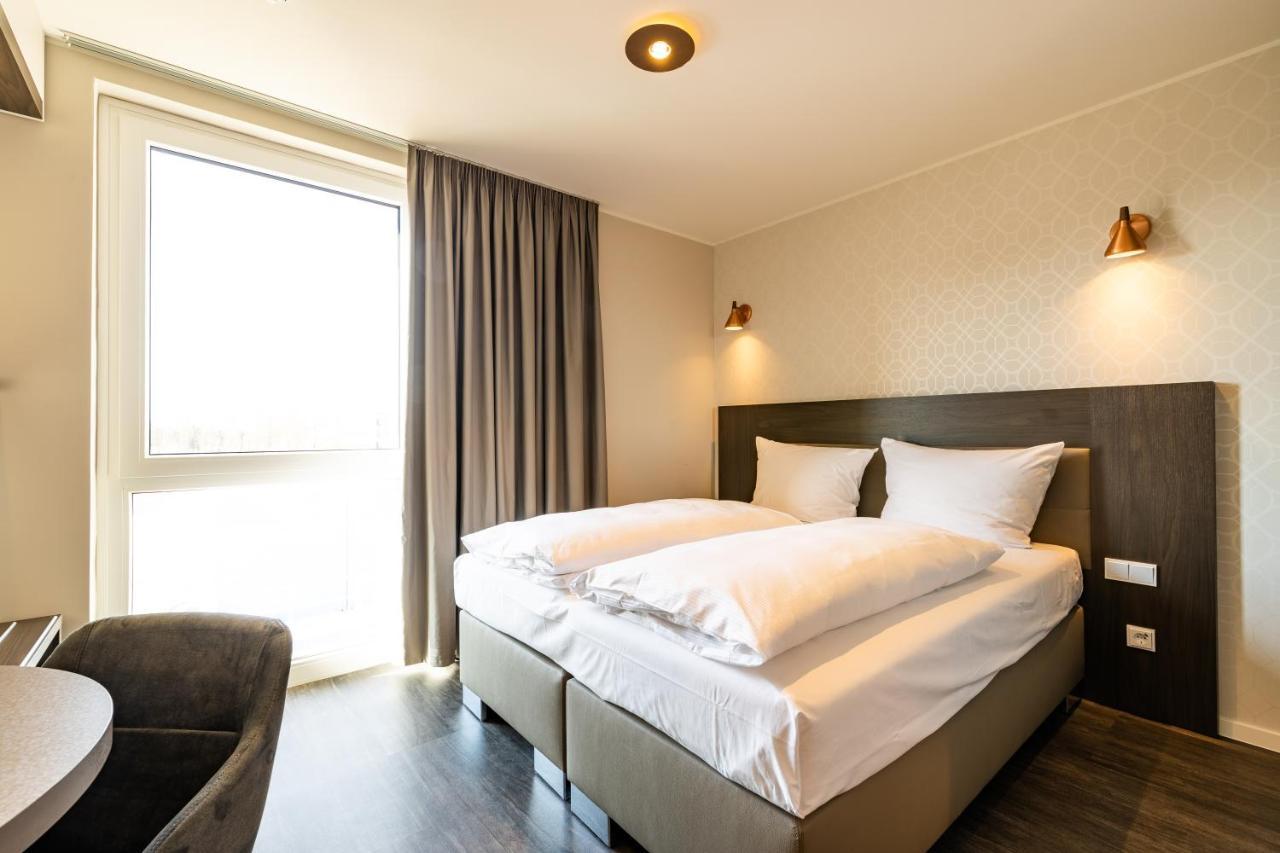 Maseven Muenchen Messe Dornach Aparthotel Aschheim Buitenkant foto